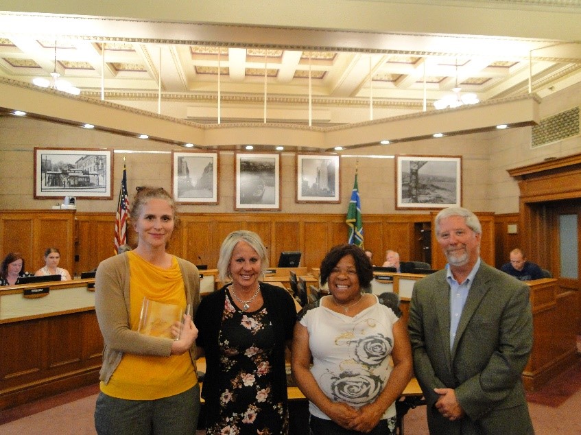 Tina Marici and Peggy Walsh, Representing Harbor Bay Real Estate Advisors, with Planning Commission President Janet Kennedy and Director Keith Hamre