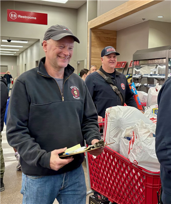 DFD employees shopping for toys